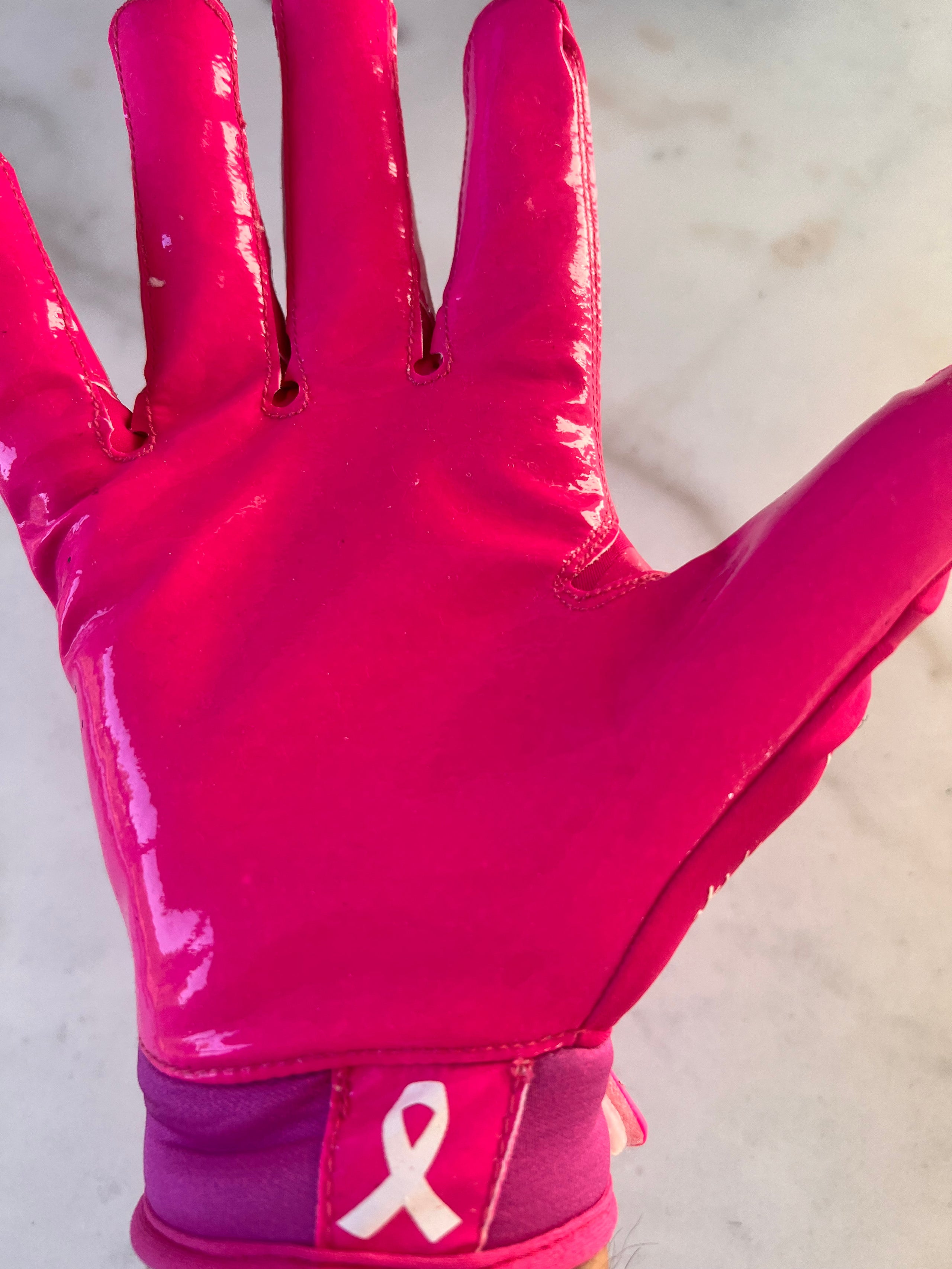 Pink football gloves under armour discount
